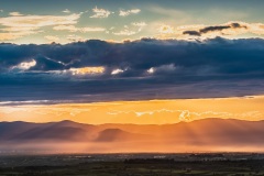 Sonnenuntergang oberhalb der Berghausener Kapelle mit Sicht ins Elsass